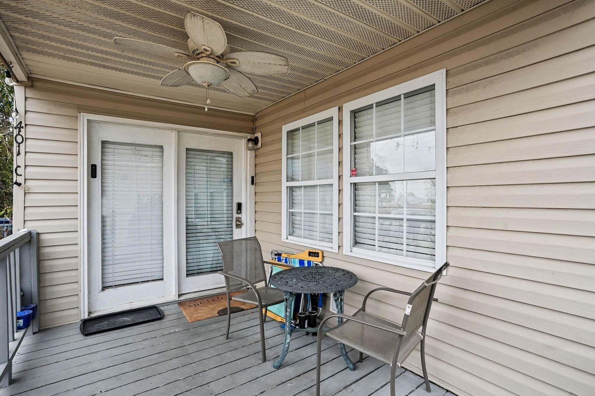 Image 2: Wooden deck with ceiling fan Image 2: Wooden deck with ceiling fan