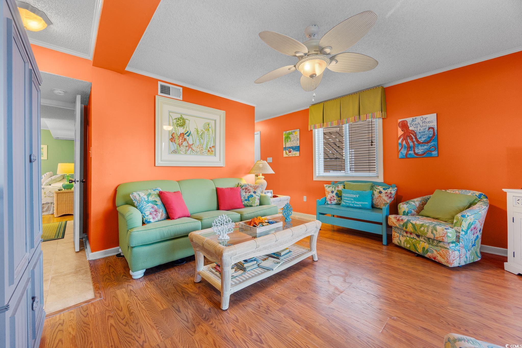 Image 4: Living room with ornamental molding, wood finished Image 4: Living room with ornamental molding, wood finished