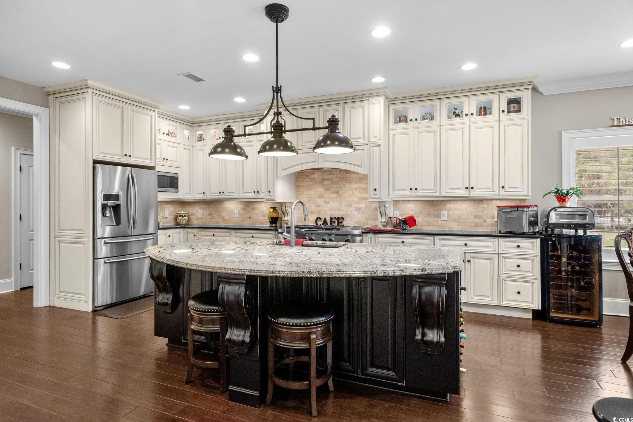 Image 4: All Custom Cabinets and Granite Tops
