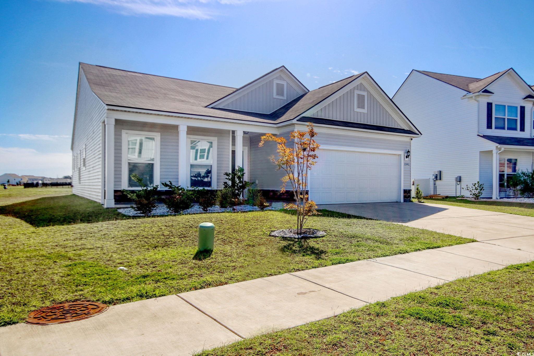 Image 3: View of front of property with a porch, driveway, Image 3: View of front of property with a porch, driveway,
