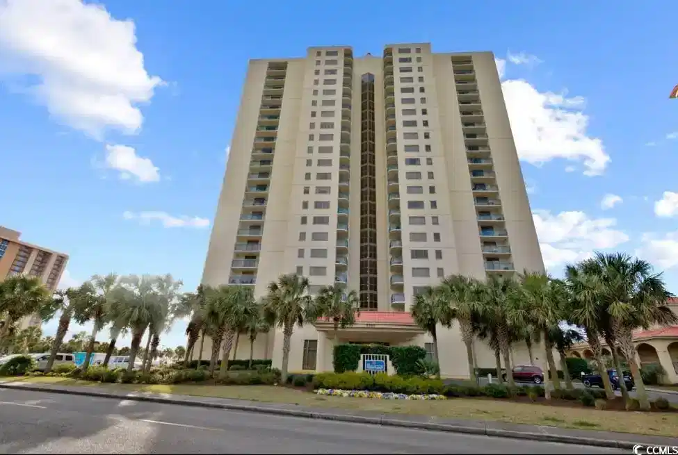 Image 1: View of apartment building / complex