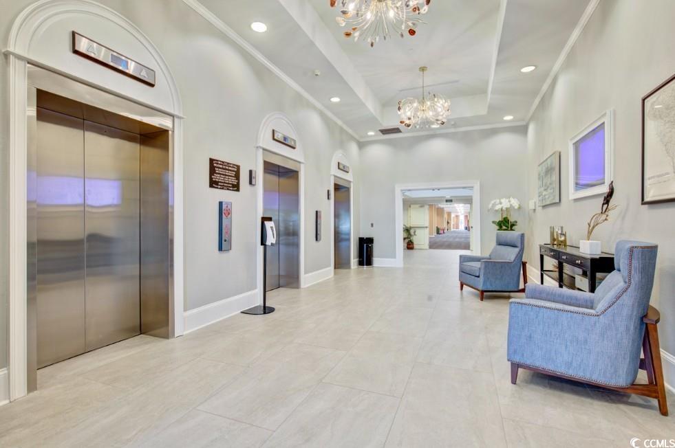 Image 2: Lobby with a high ceiling, recessed lighting, and Image 2: Lobby with a high ceiling, recessed lighting, and