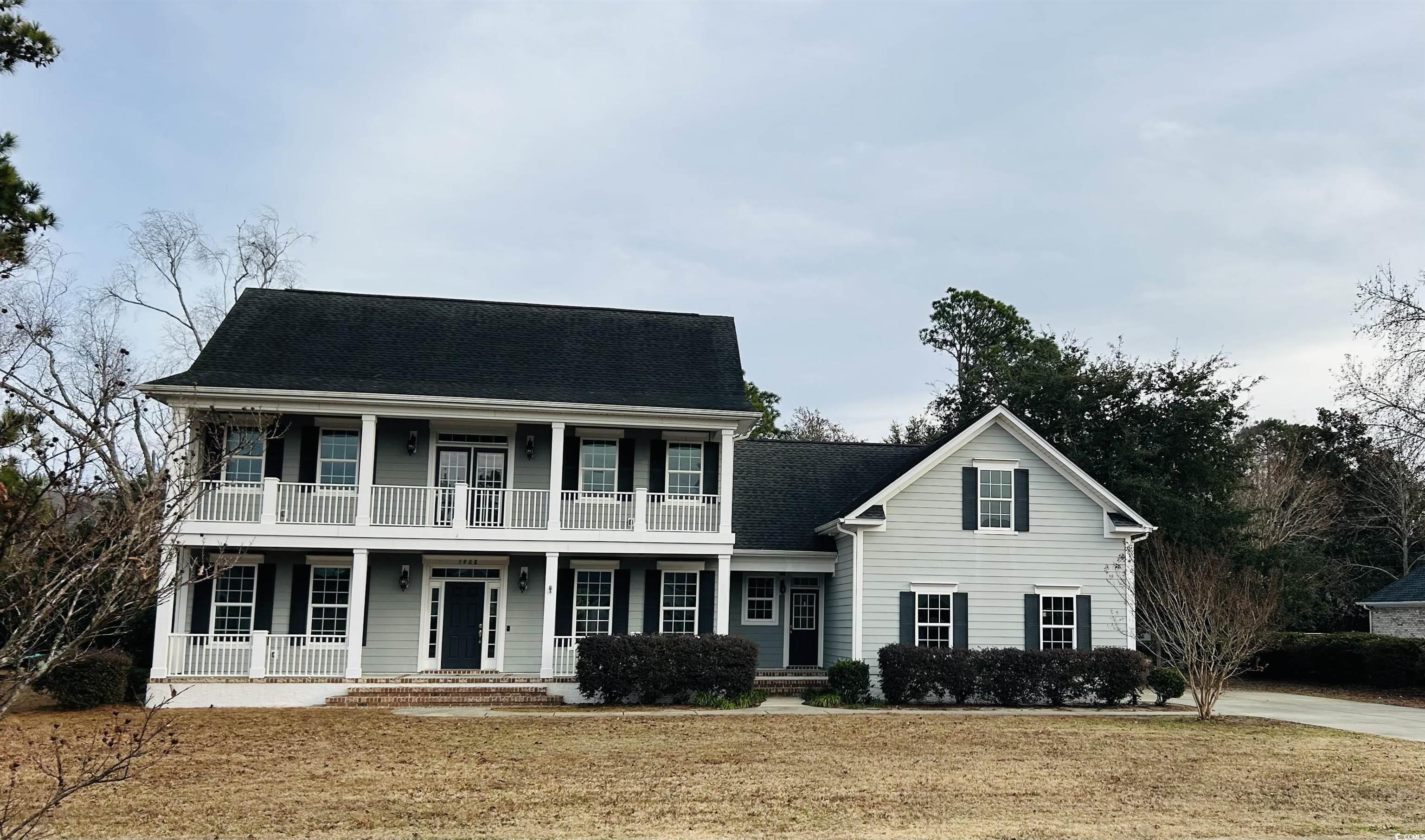 Image 1: View of front of house featuring covered porch and Image 1: View of front of house featuring covered porch and
