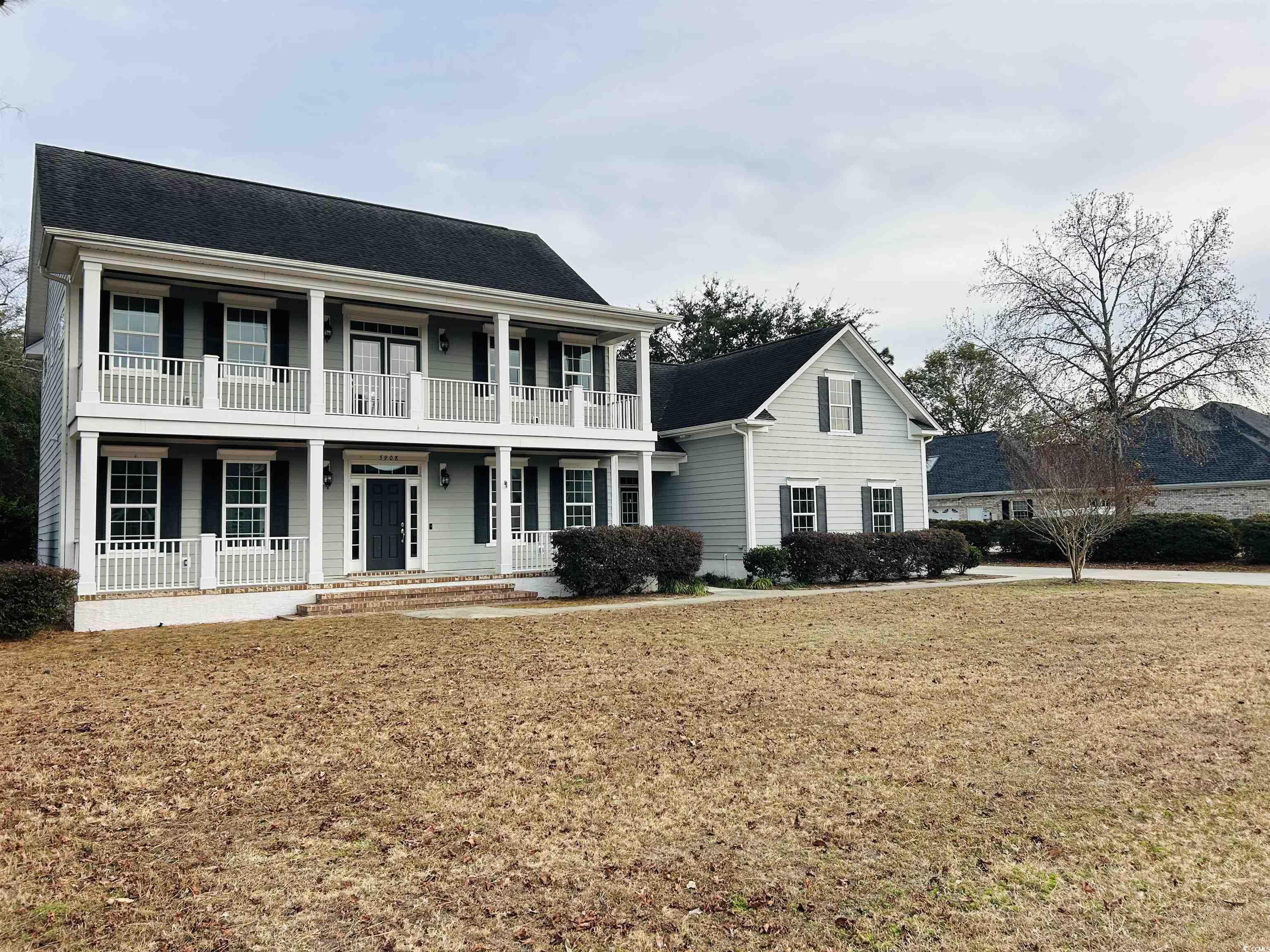 Image 3: View of front of property featuring a porch, a shi Image 3: View of front of property featuring a porch, a shi