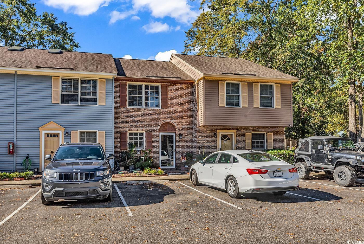 Image 1: View of front of property with uncovered parking, Image 1: View of front of property with uncovered parking,