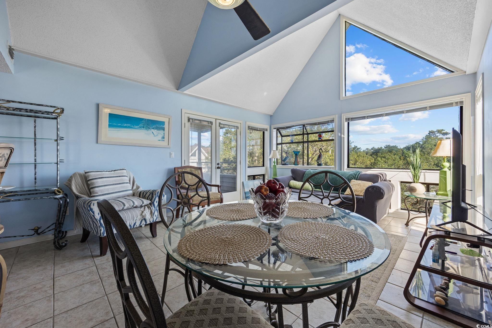 Image 4: Sunroom featuring high vaulted ceiling, french doo Image 4: Sunroom featuring high vaulted ceiling, french doo