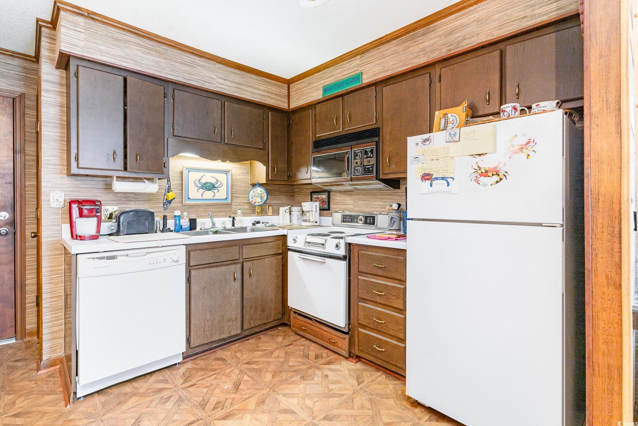 Image 3: Kitchen featuring white appliances, crown molding, Image 3: Kitchen featuring white appliances, crown molding,