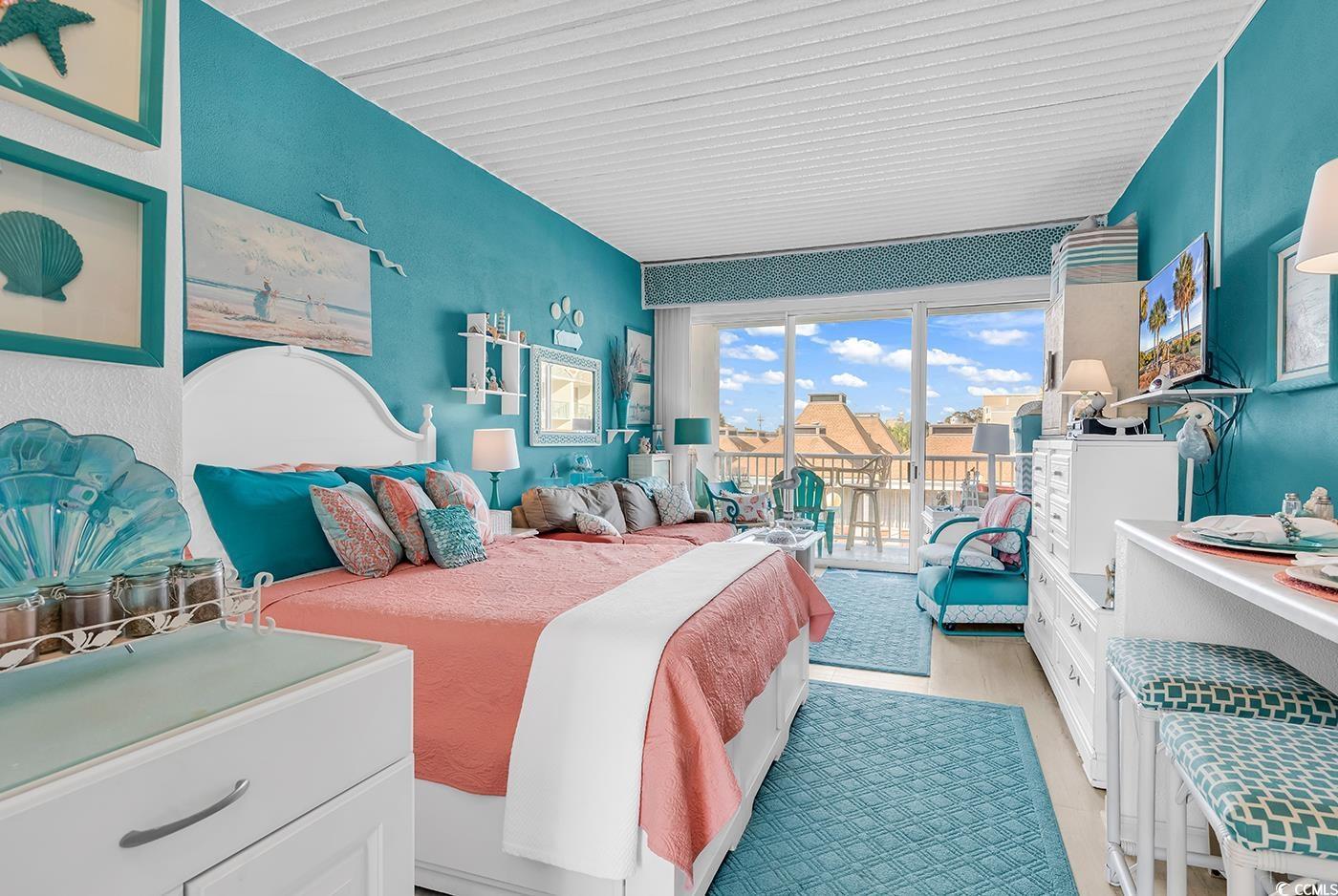 Image 2: Bedroom featuring light hardwood / wood-style floo Image 2: Bedroom featuring light hardwood / wood-style floo