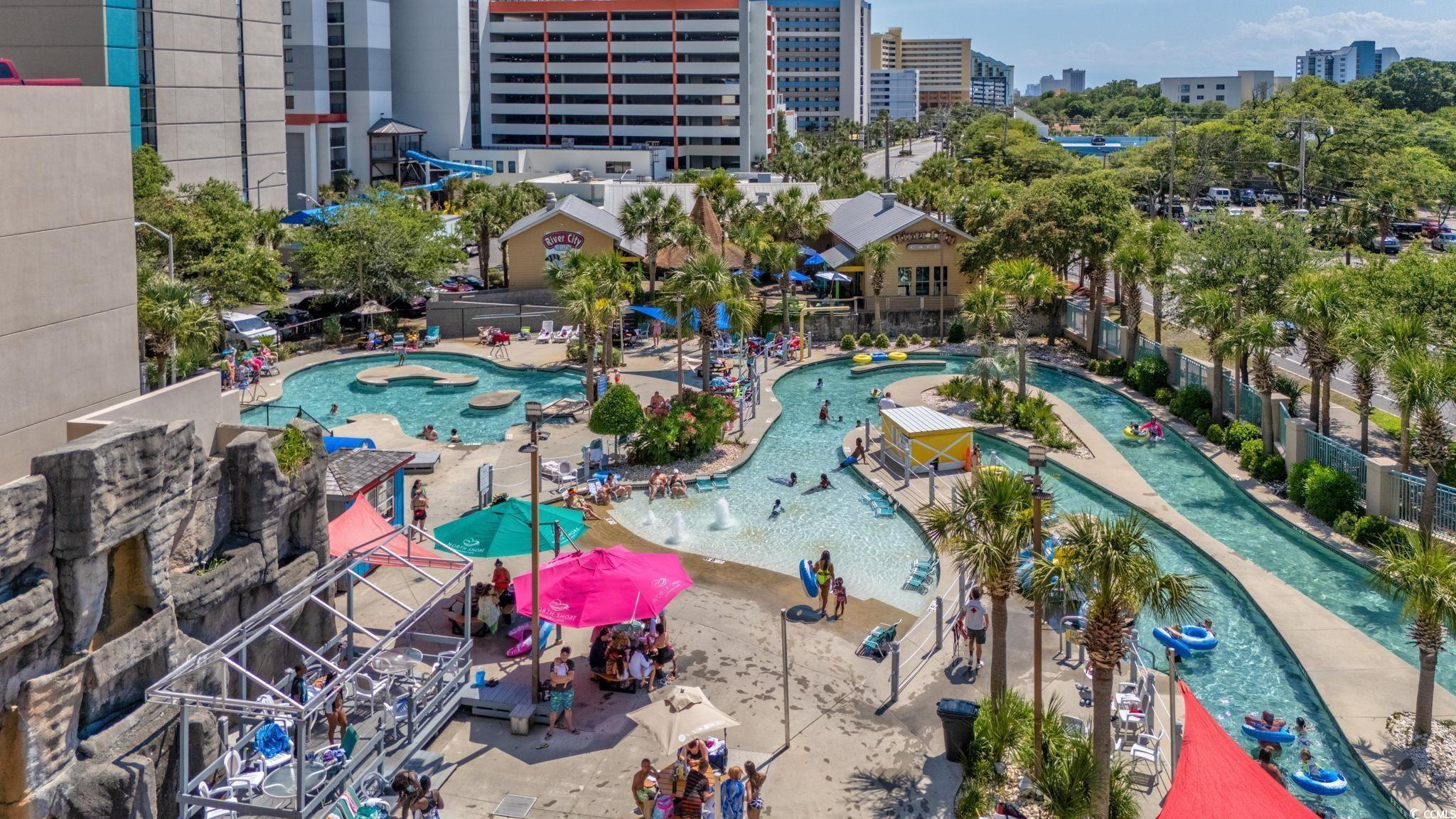 Image 3: View of urban area featuring a pool area Image 3: View of urban area featuring a pool area