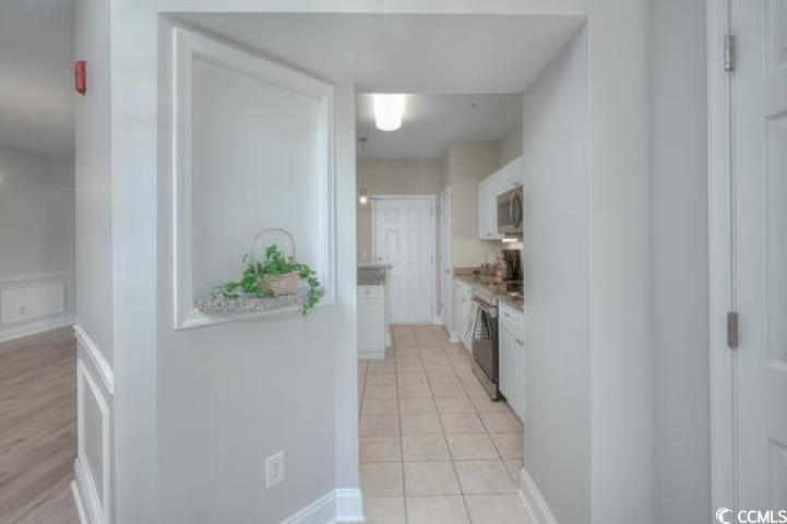 Image 2: Kitchen featuring white cabinetry, appliances with Image 2: Kitchen featuring white cabinetry, appliances with