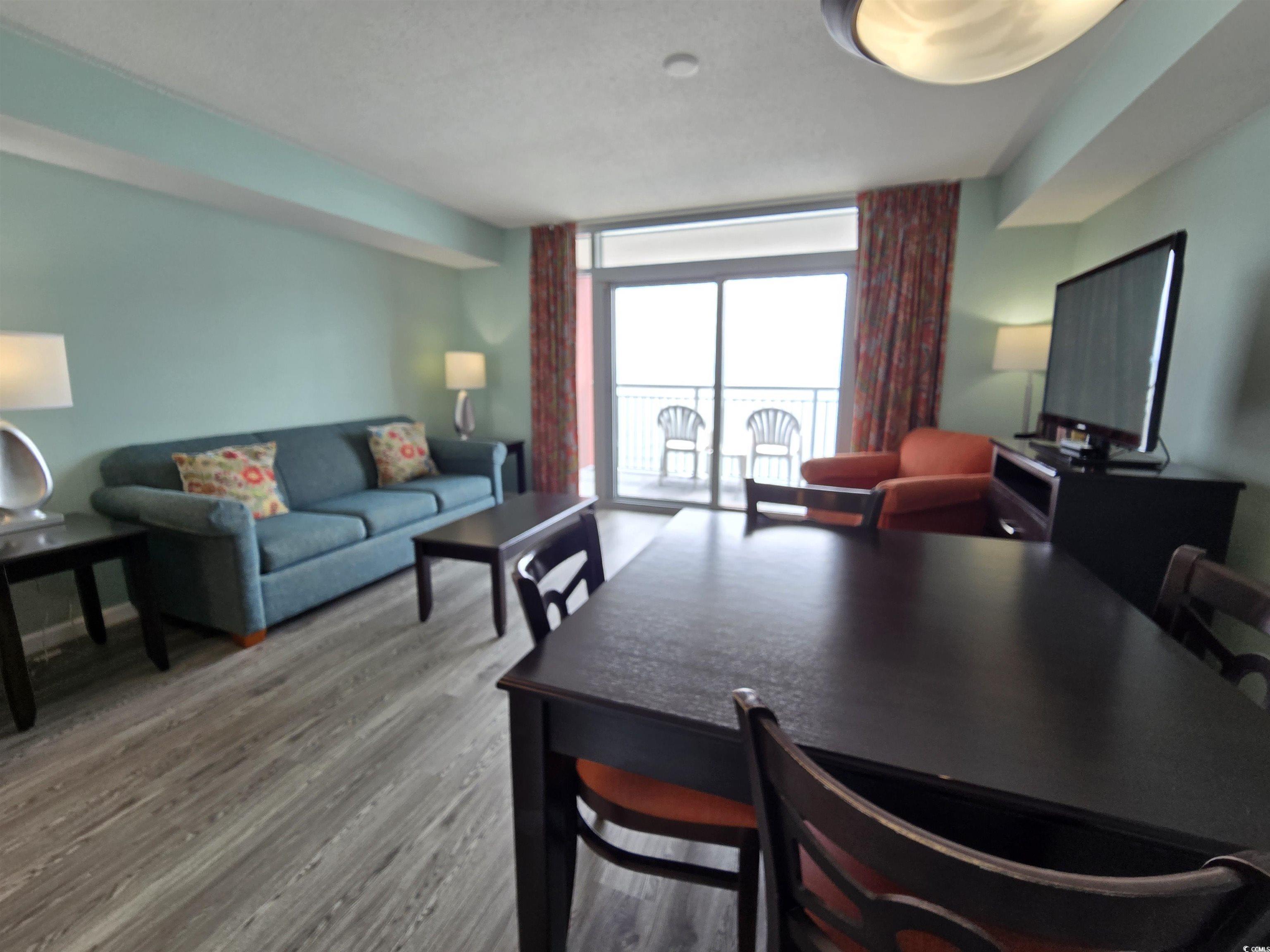 Image 3: Dining room featuring light wood-style floors and Image 3: Dining room featuring light wood-style floors and