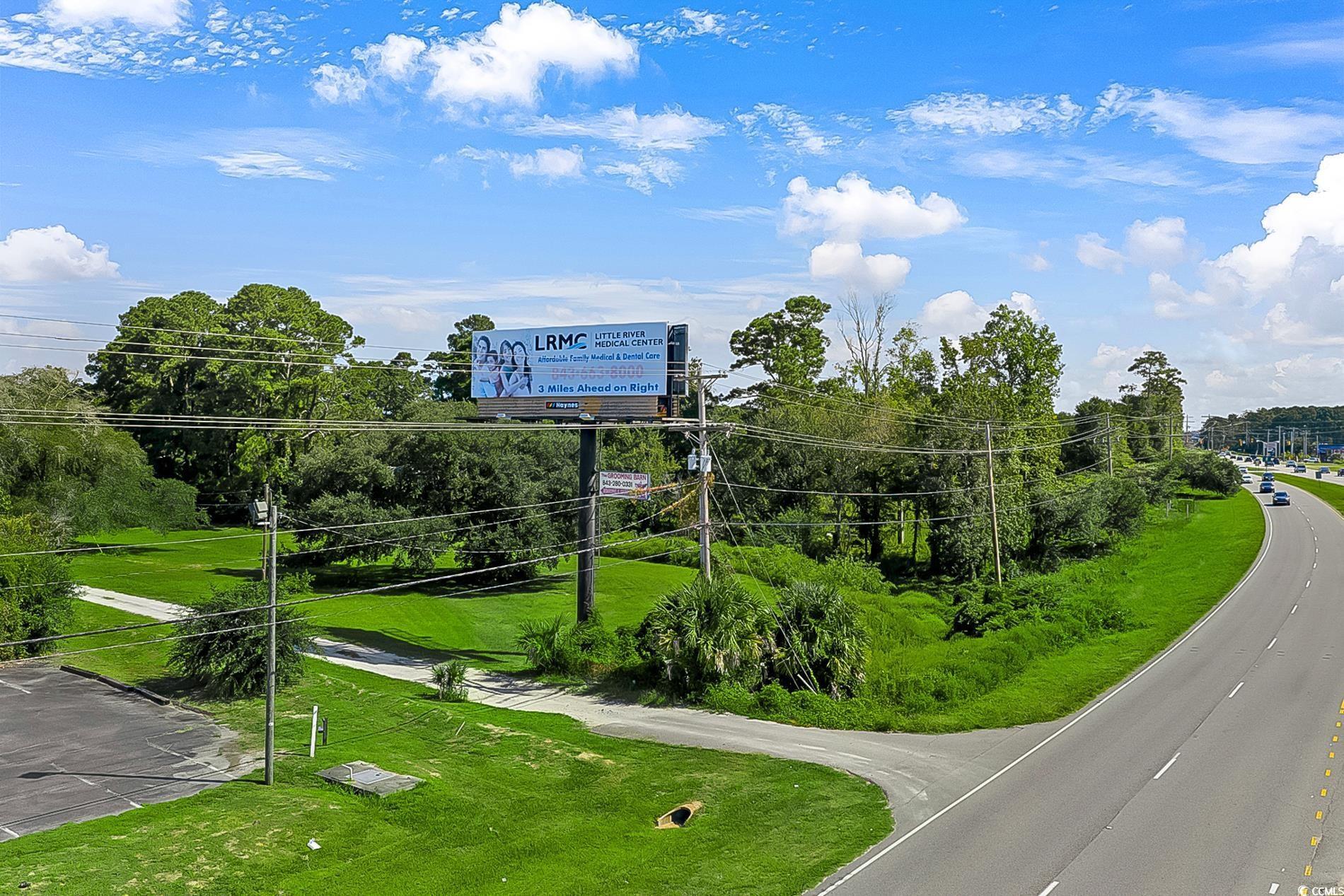 Image 4: View of home's community featuring view of wooded Image 4: View of home's community featuring view of wooded