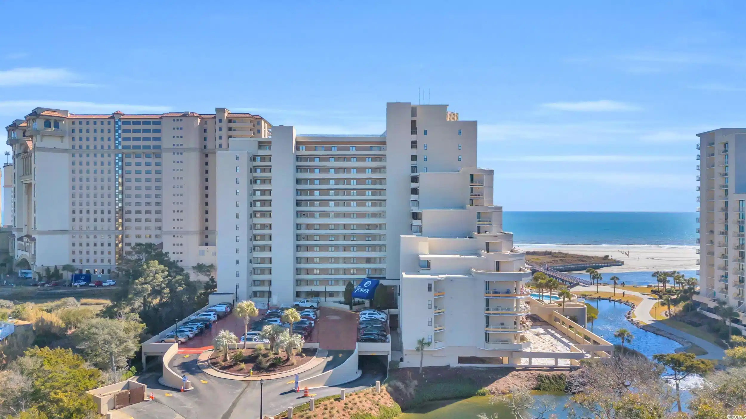 Image 1: View of apartment building / complex featuring a w
