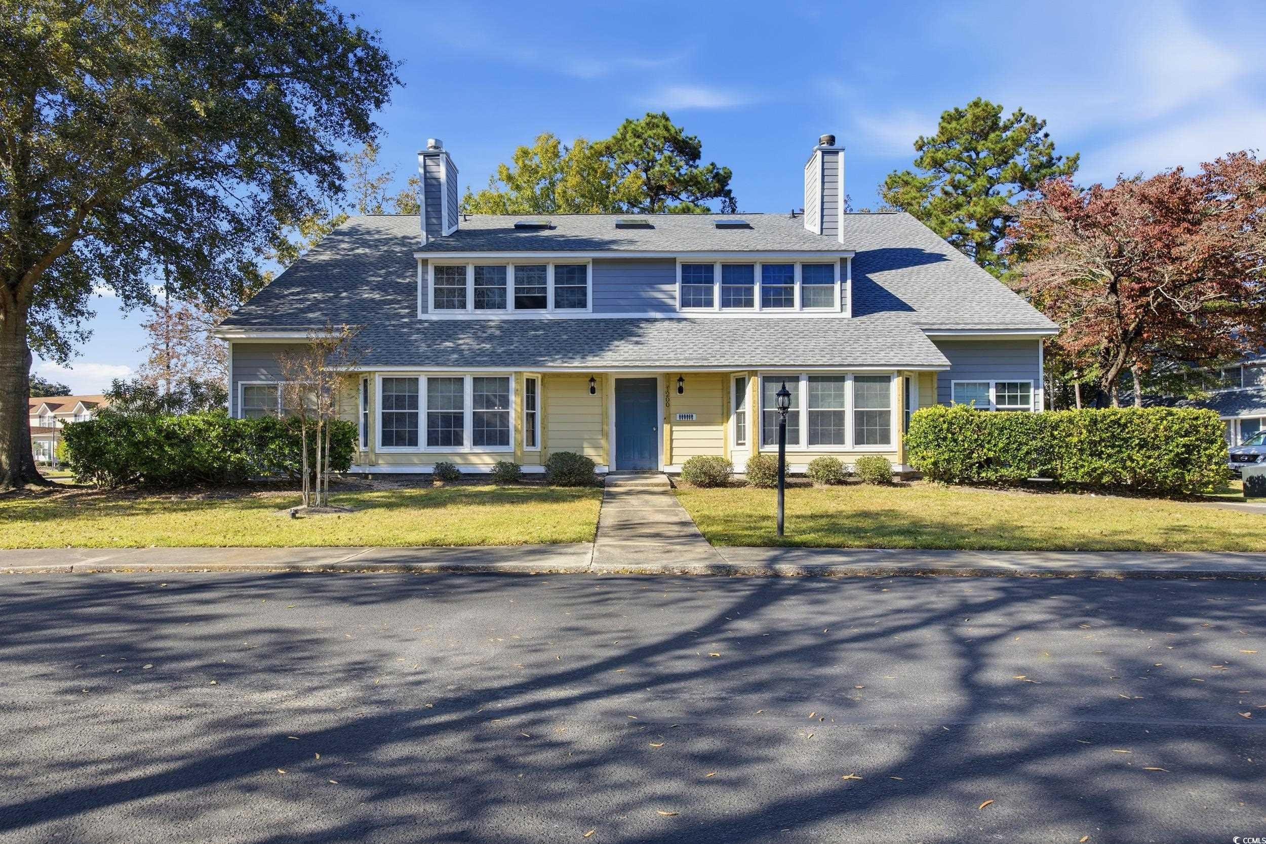 Image 1: View of front of property with a chimney, a front Image 1: View of front of property with a chimney, a front