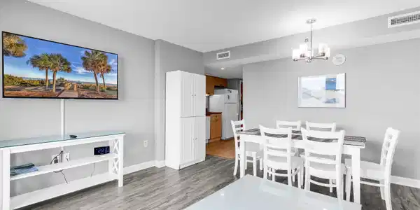Image 2: Dining area with wood finished floors, a chandelie Image 2: Dining area with wood finished floors, a chandelie