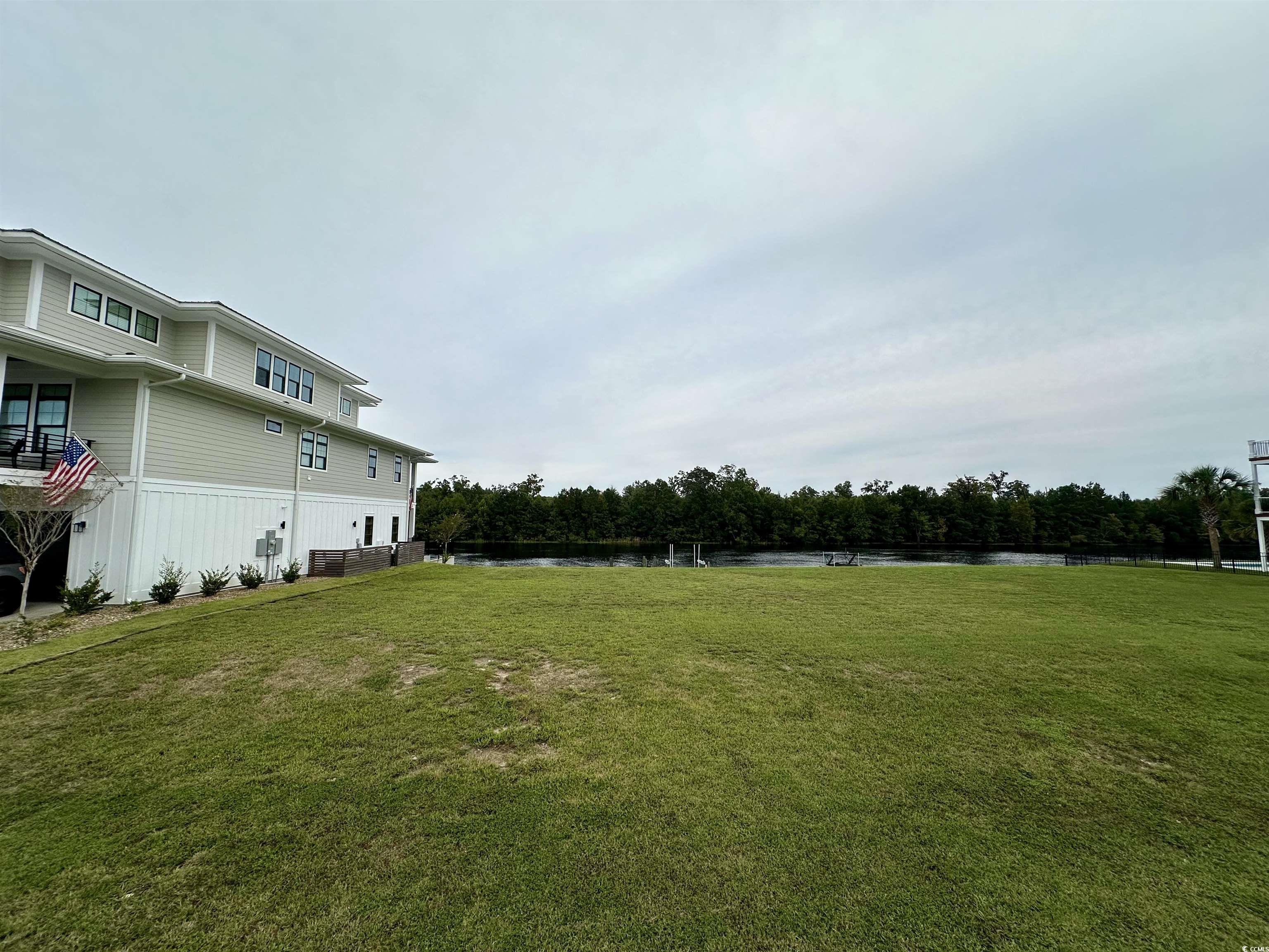 Image 3: View of yard featuring a water view
