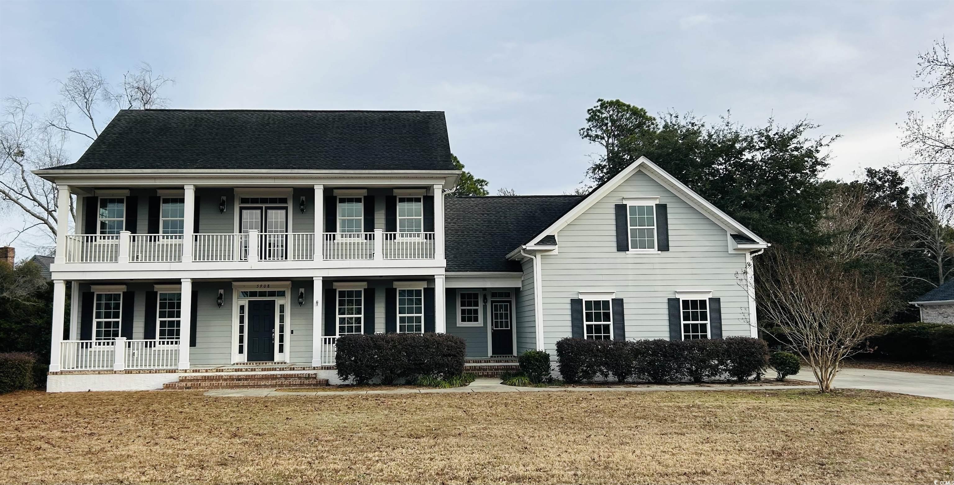 Image 4: View of front of house featuring covered porch, a Image 4: View of front of house featuring covered porch, a