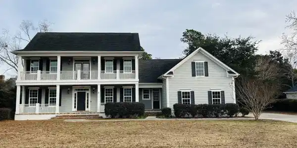 Image 4: View of front of house featuring covered porch, a
