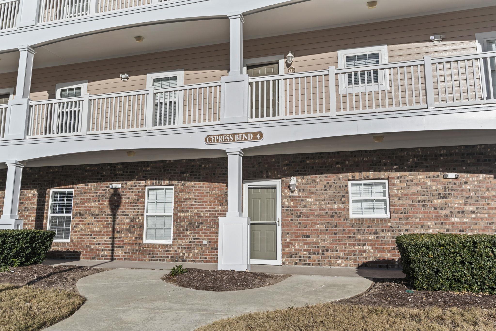 Image 2: Property entrance featuring brick siding Image 2: Property entrance featuring brick siding