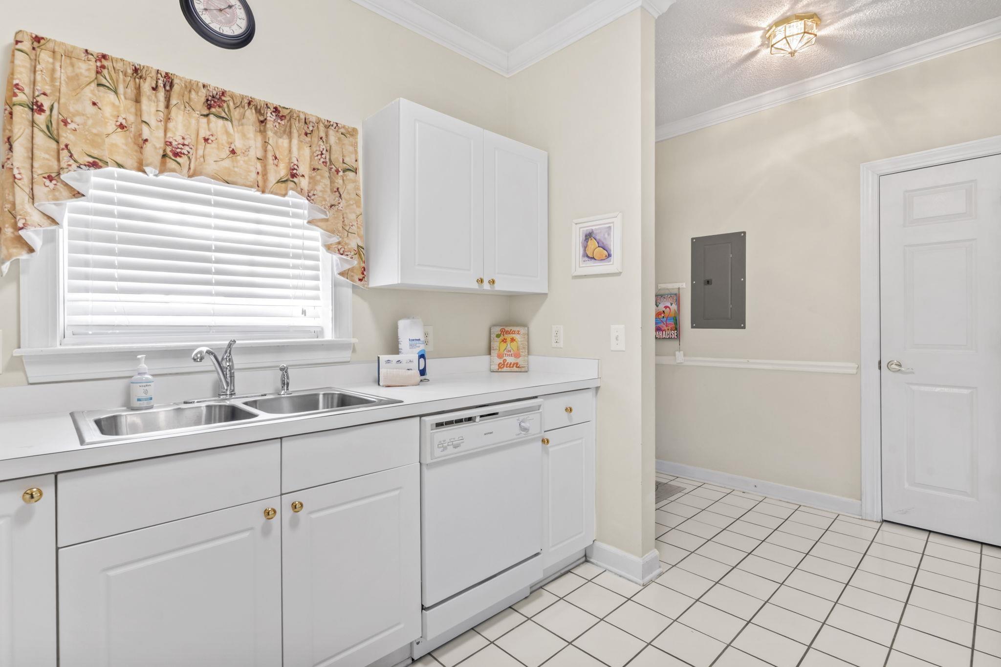 Image 3: Kitchen featuring white cabinets, light countertop Image 3: Kitchen featuring white cabinets, light countertop