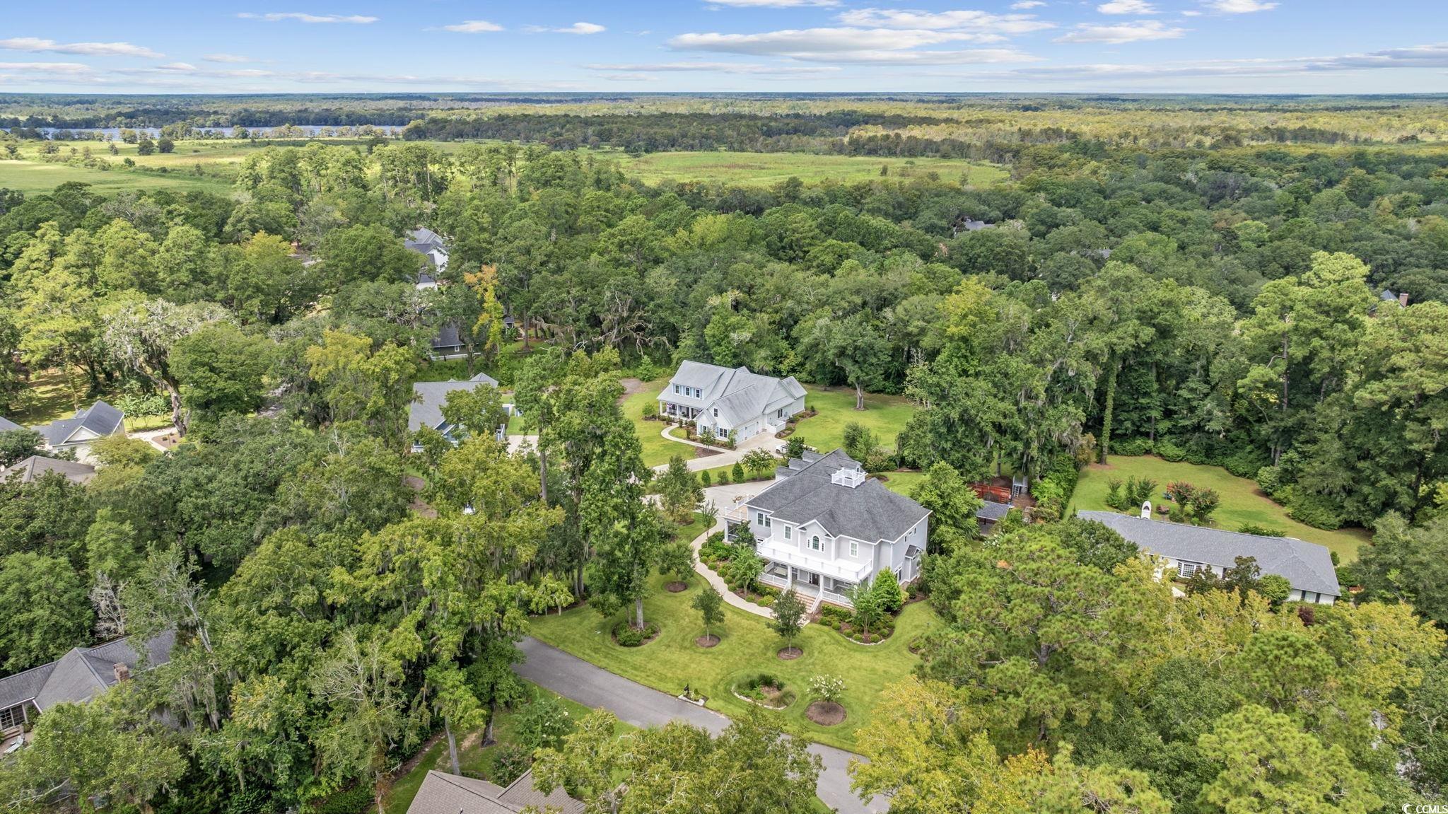 Image 3: Aerial view of property's location featuring a for