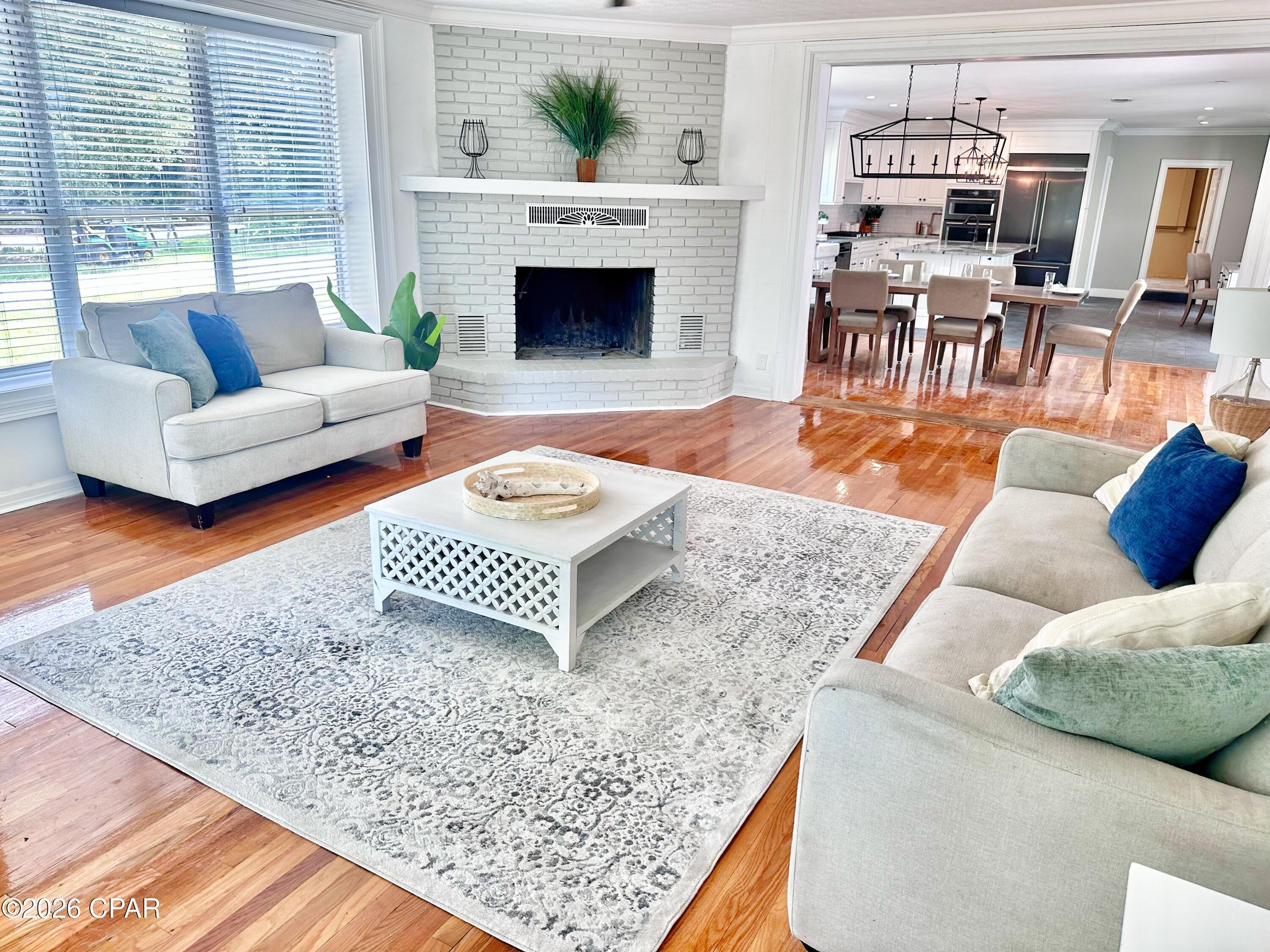 Image 4: Family Room open to kitchen & dining