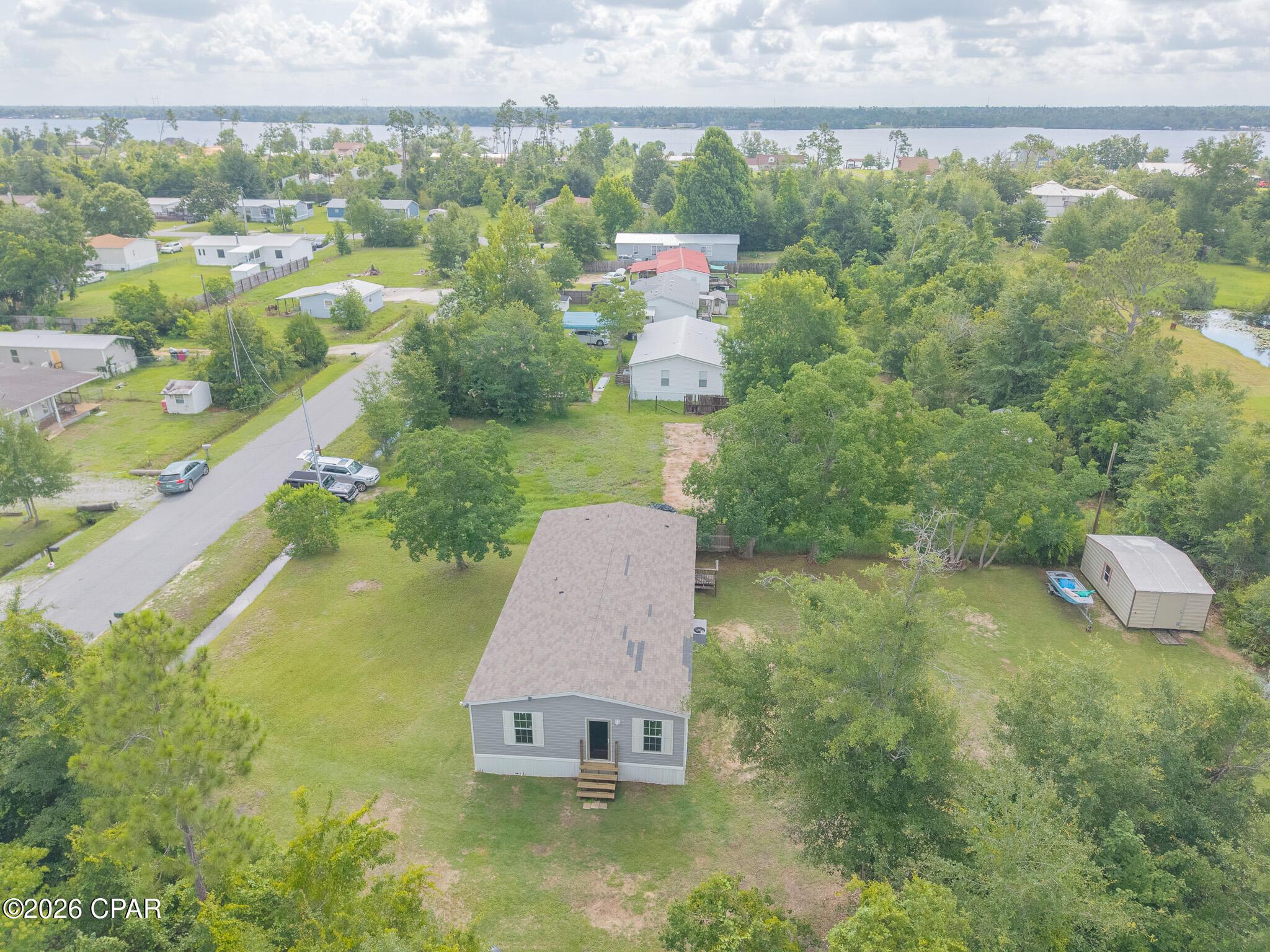 Image 2: 3700 Atlantis Dr Overhead Drone Full Tra