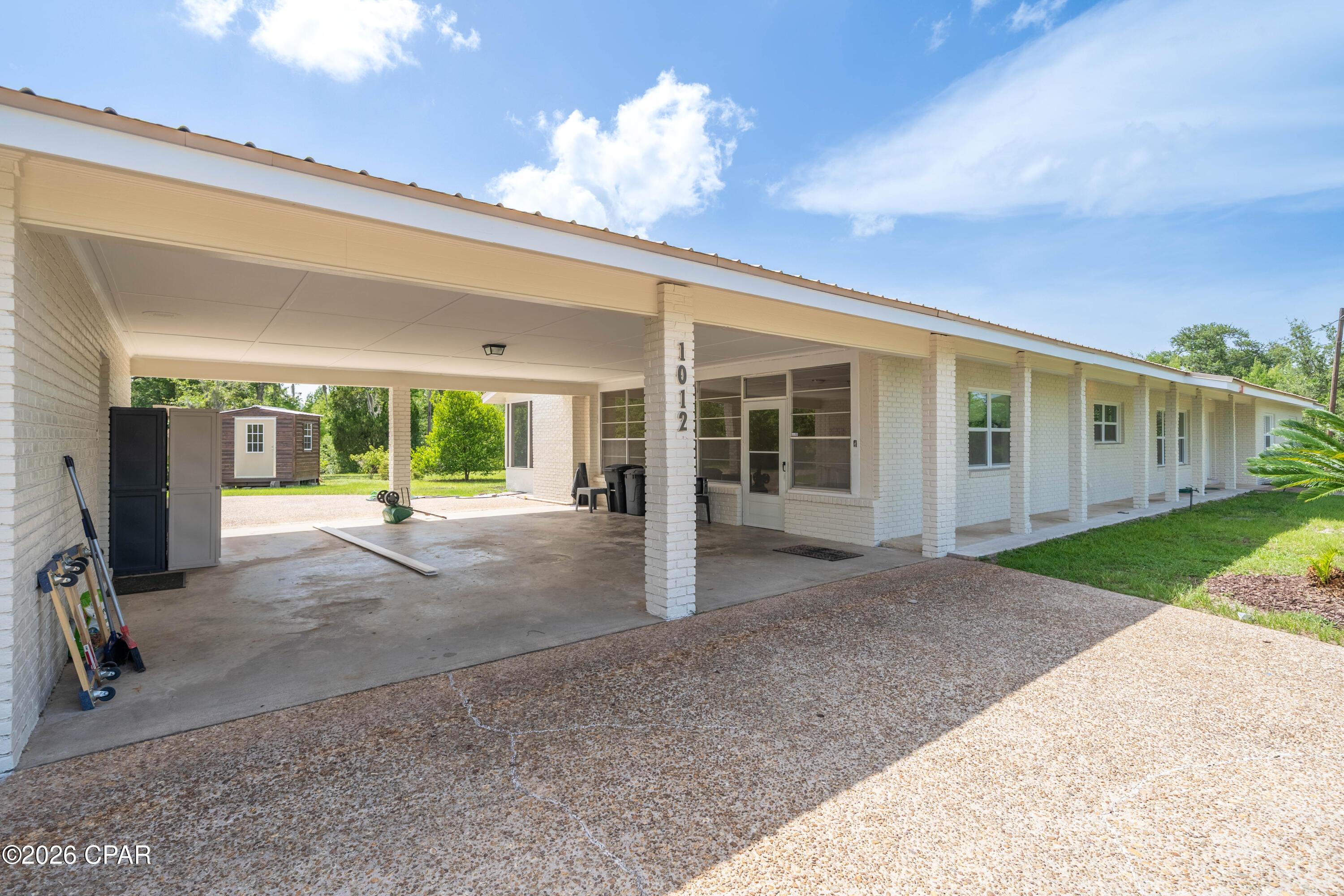 Image 3: Front Left Carport