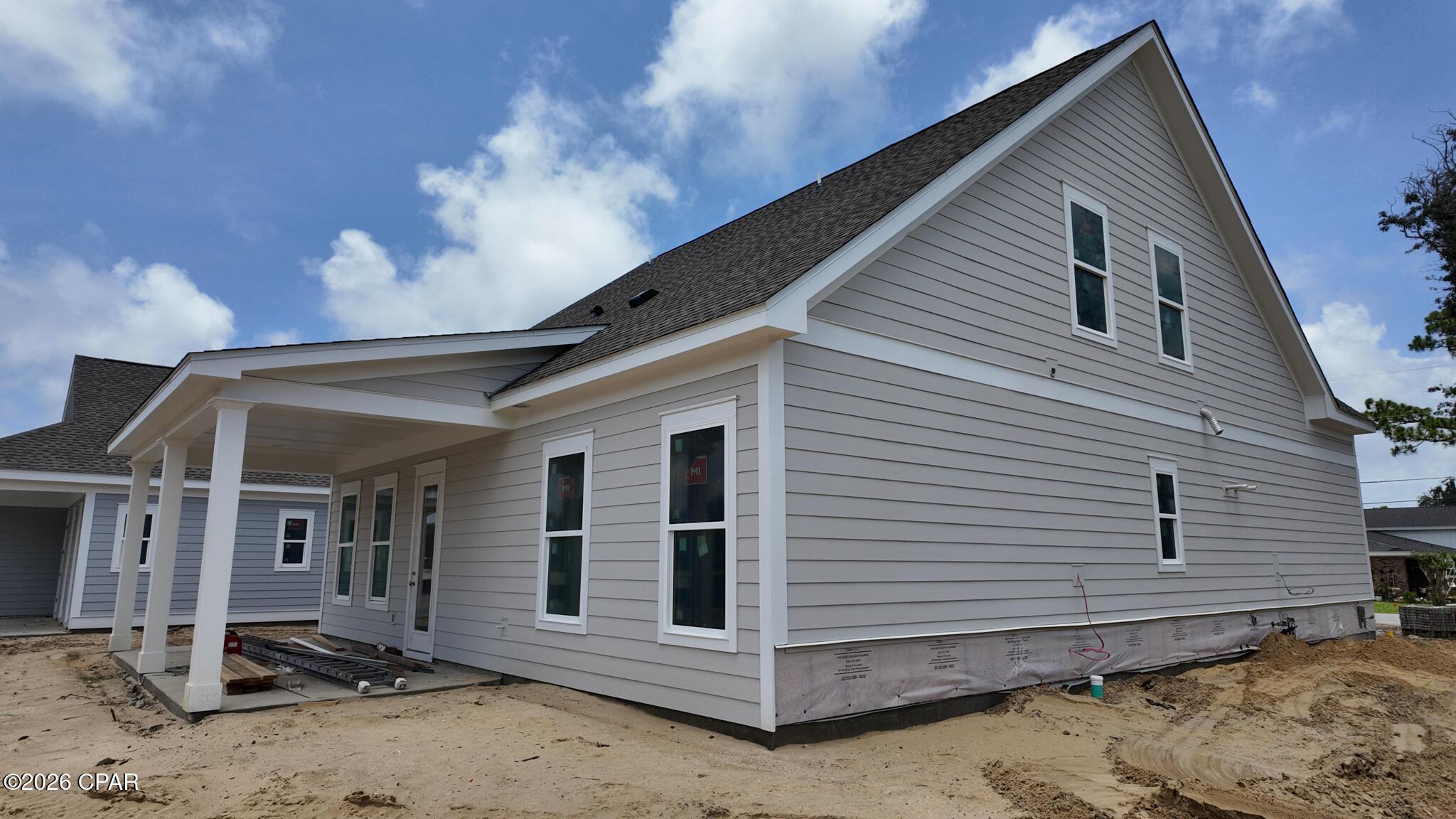 Image 2: Lot 1 Side Exterior