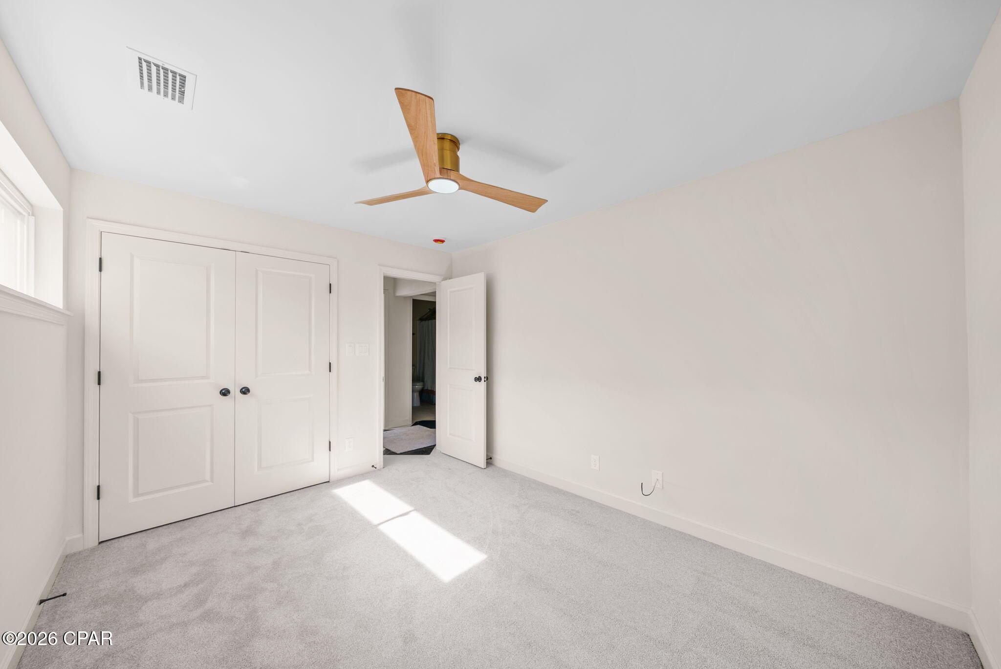 Image 3: back right bed to entry