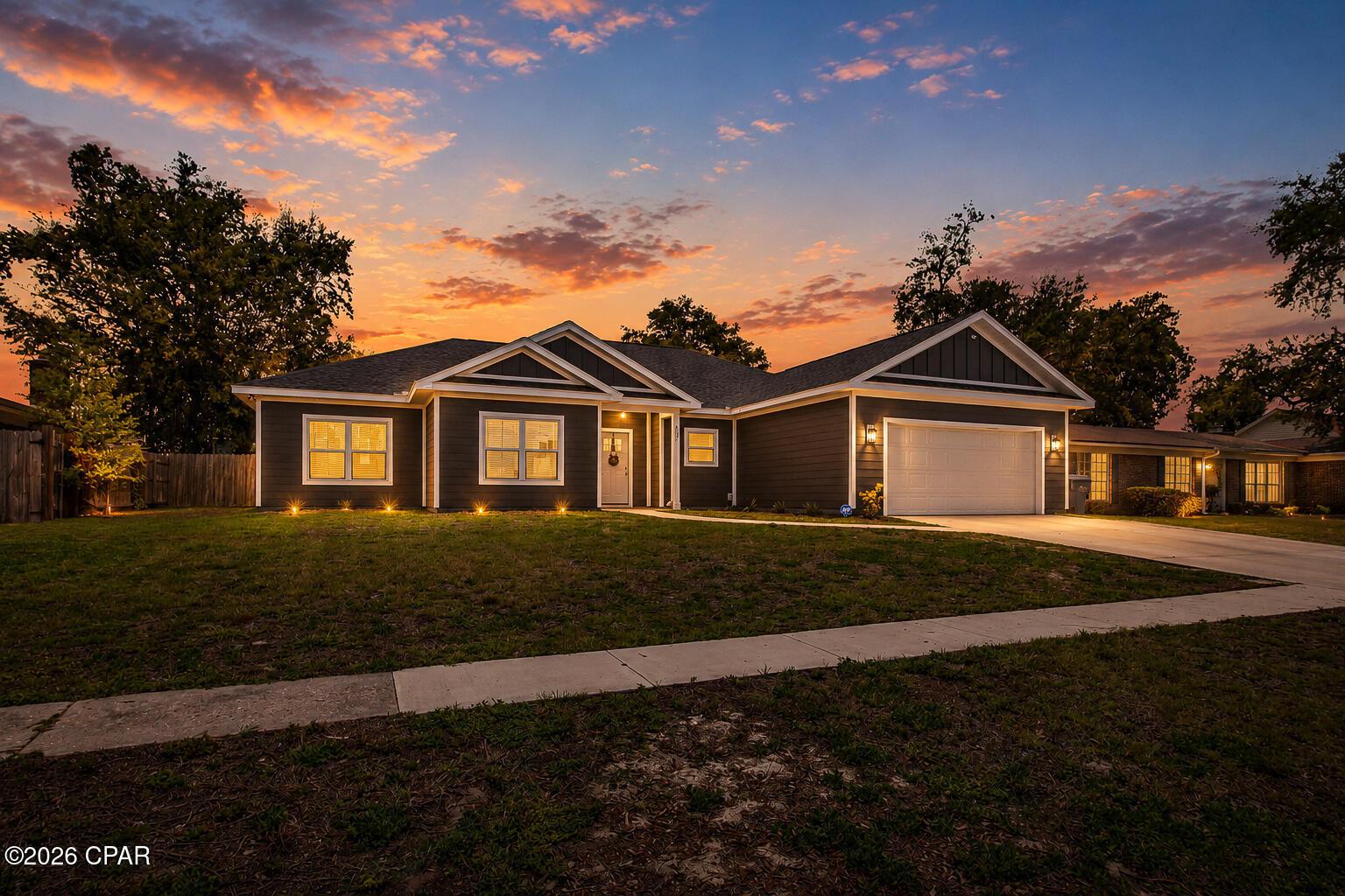 Image 2: MLS Interior Exterior Twilight-1