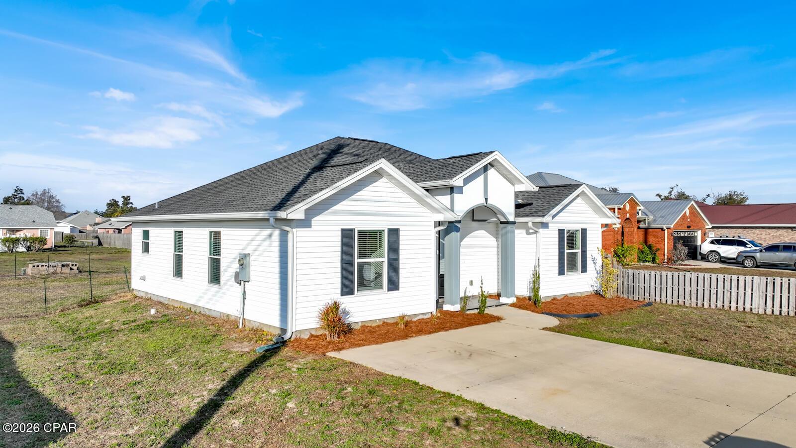 Image 2: Exterior and Side