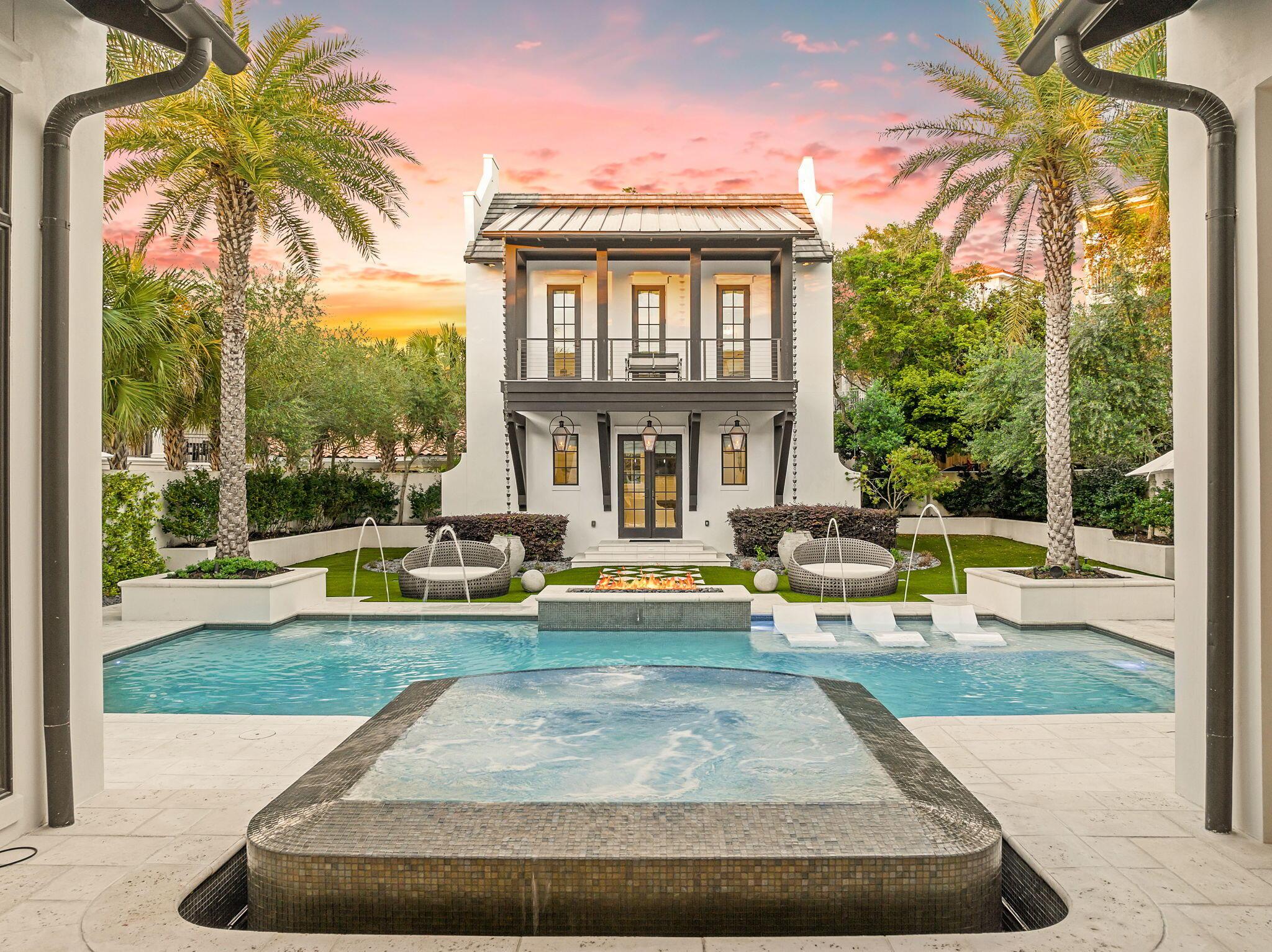 Image 1: Resort pool and carriage house