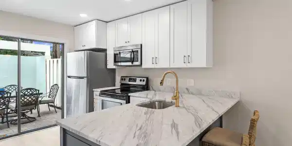 Image 2: Breakfast bar and new cabinets