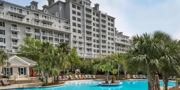 Image 2: Grand Sandestin Pool and Building
