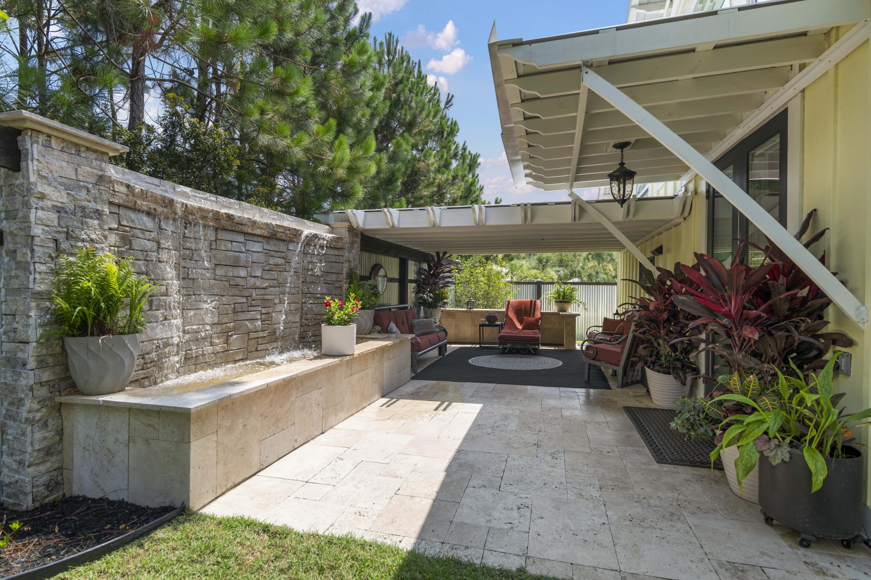 Image 3: Open Patio w/ Waterfall