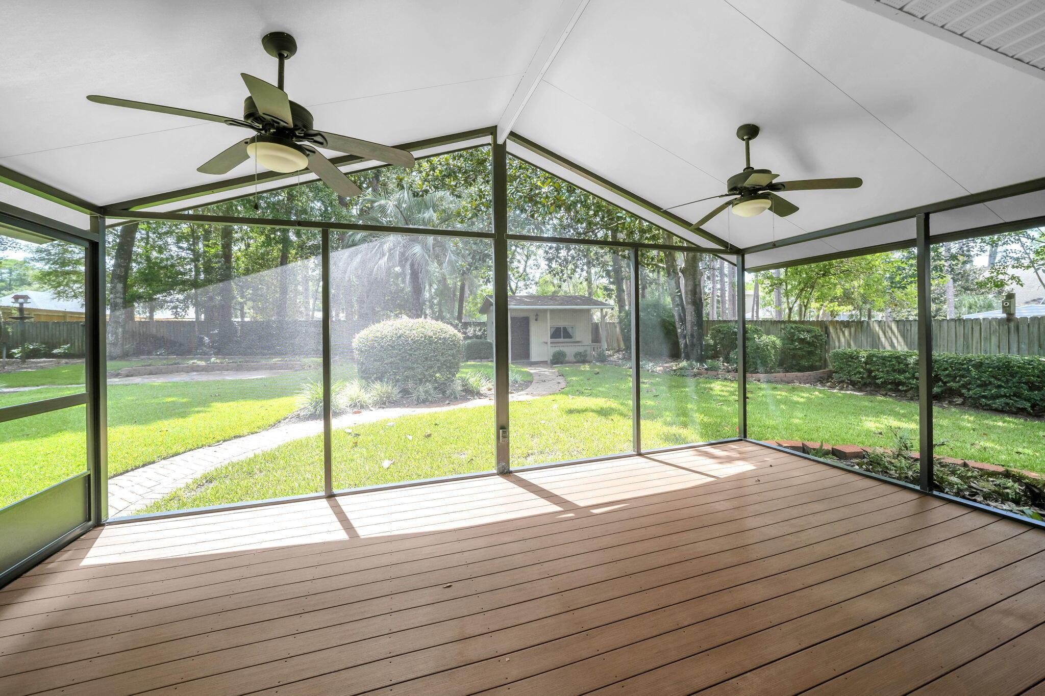 Image 4: Screened porch view to back yard