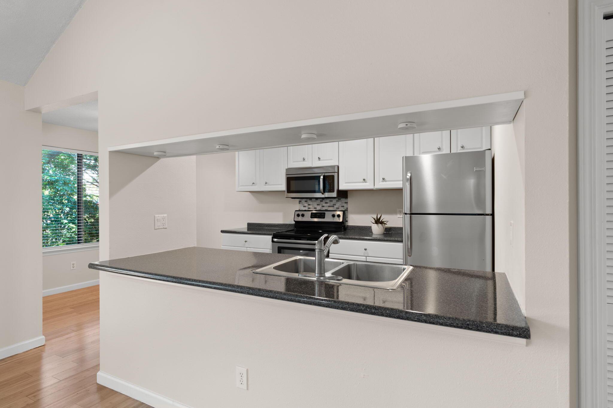 Image 4: Kitchen - Open to Living room