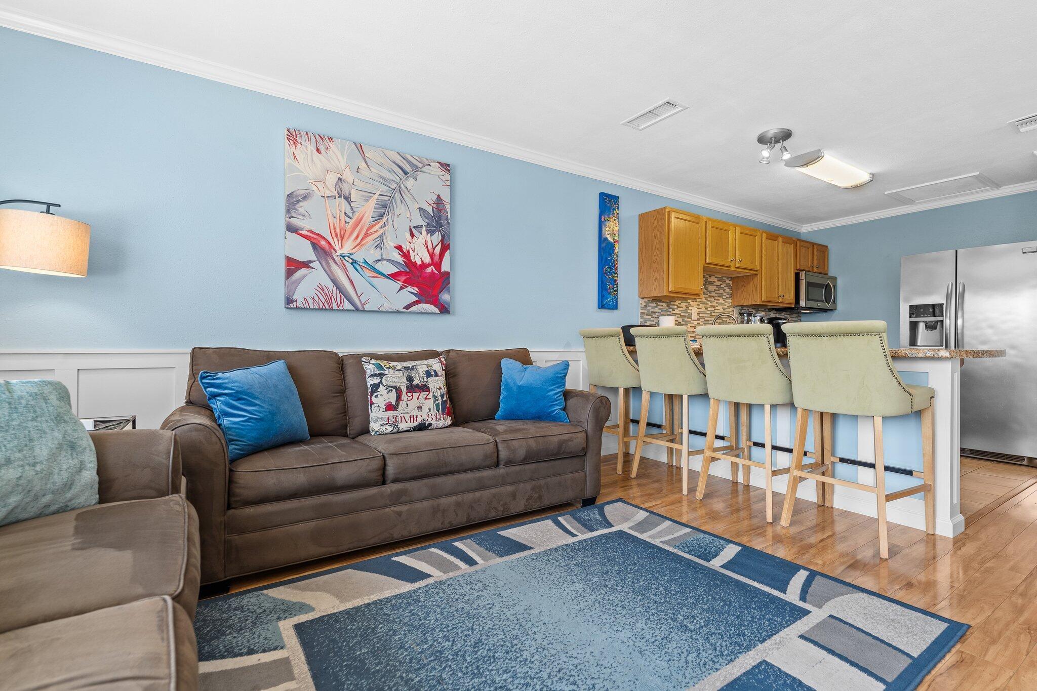 Image 4: Living Area with Breakfast Bar