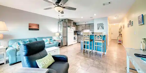 Image 4: View of living room and Dining Room