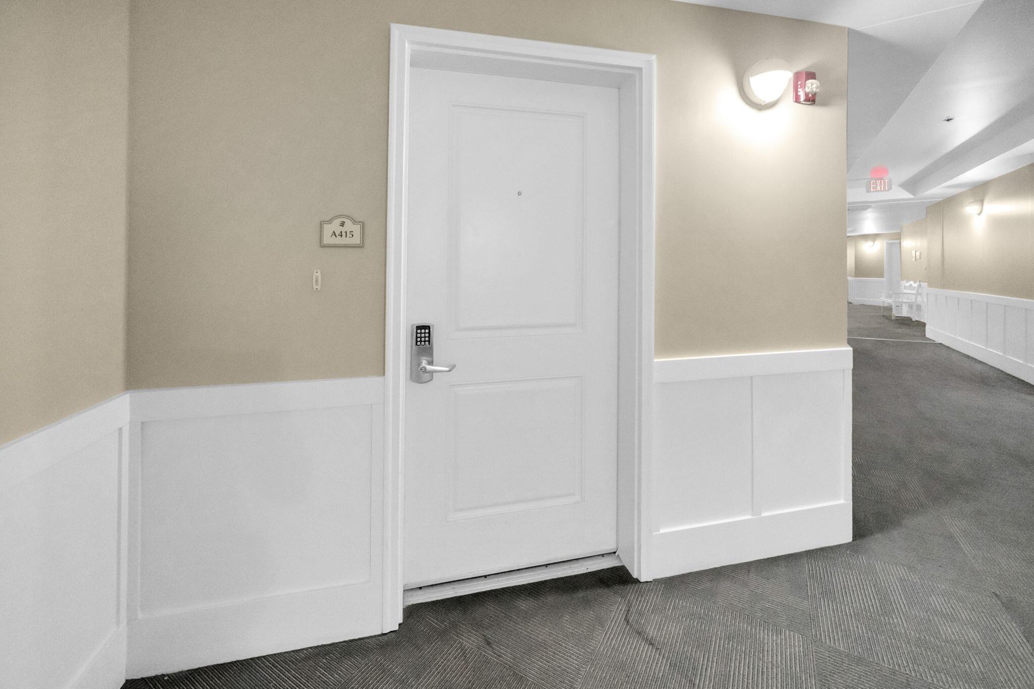 Image 4: A415 Front door in an interior corridor