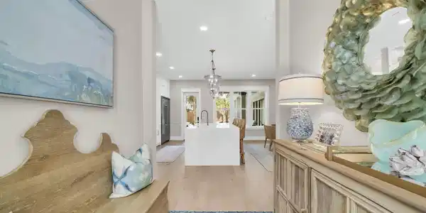 Image 3: Foyer opens to dining and kitchen