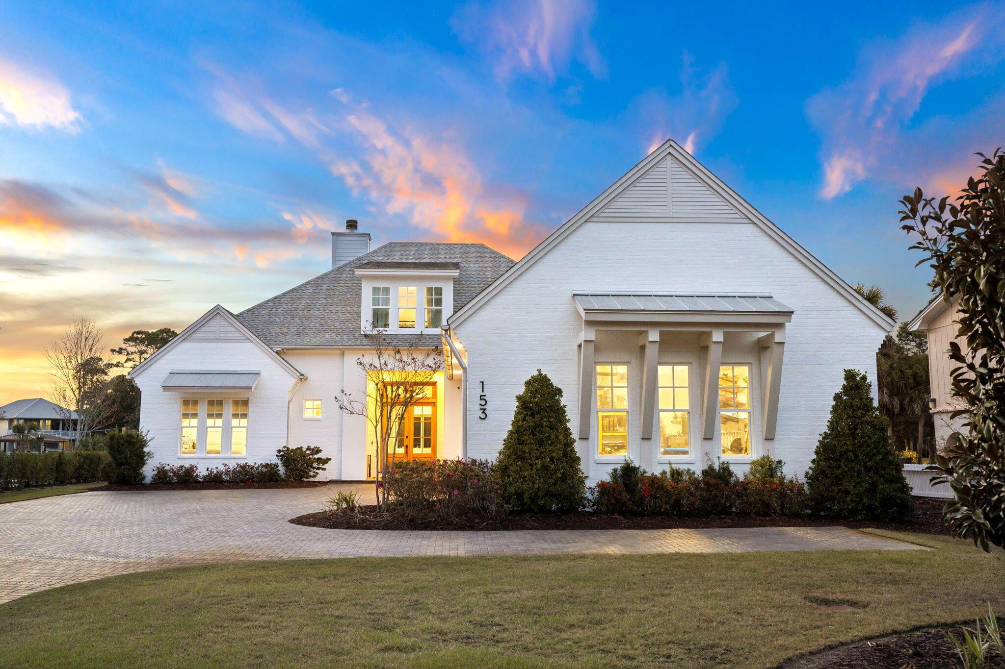 Image 1: Image #1 | Front exterior at sunset