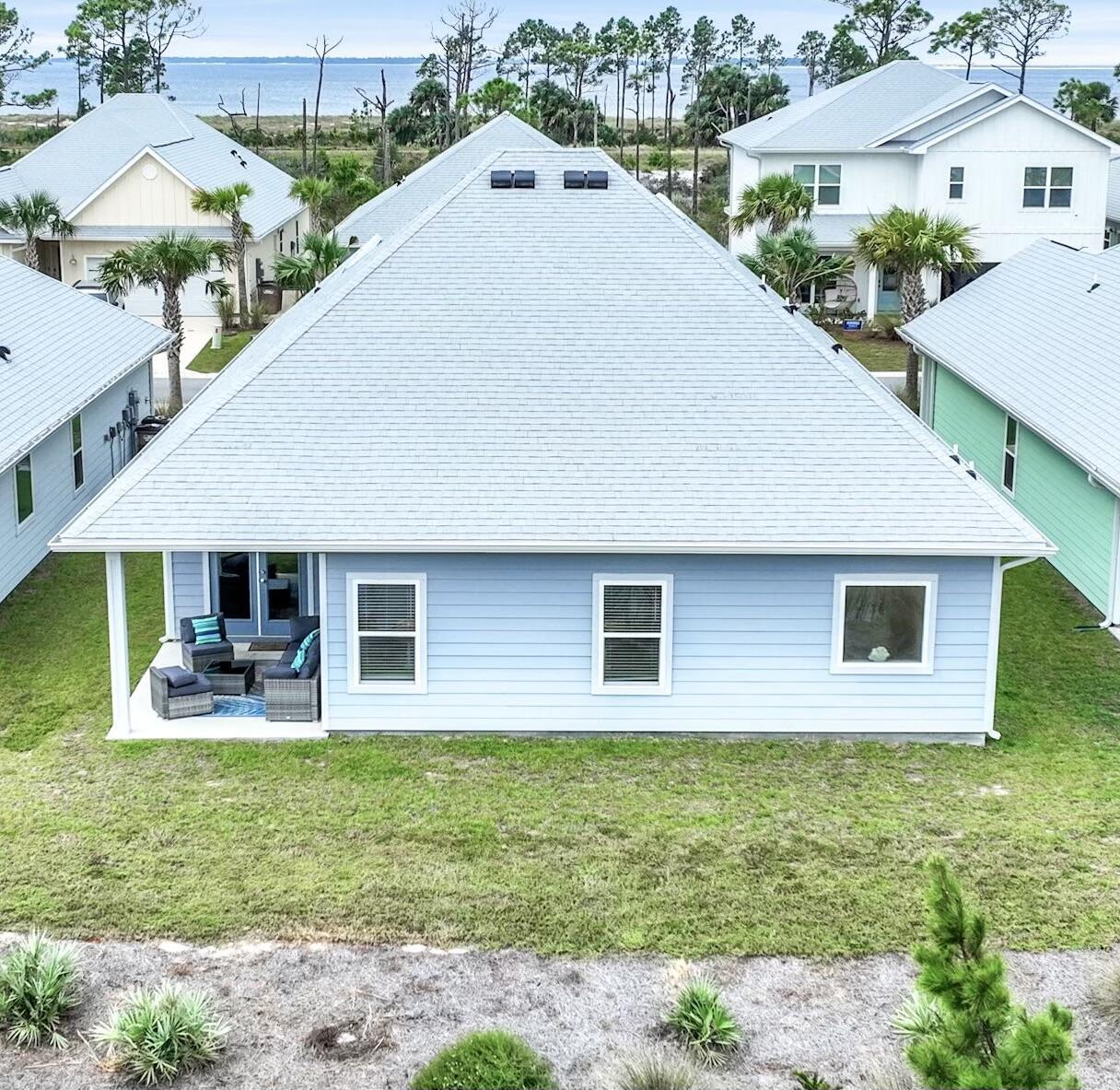 Image 1: Rear Ariel of Home