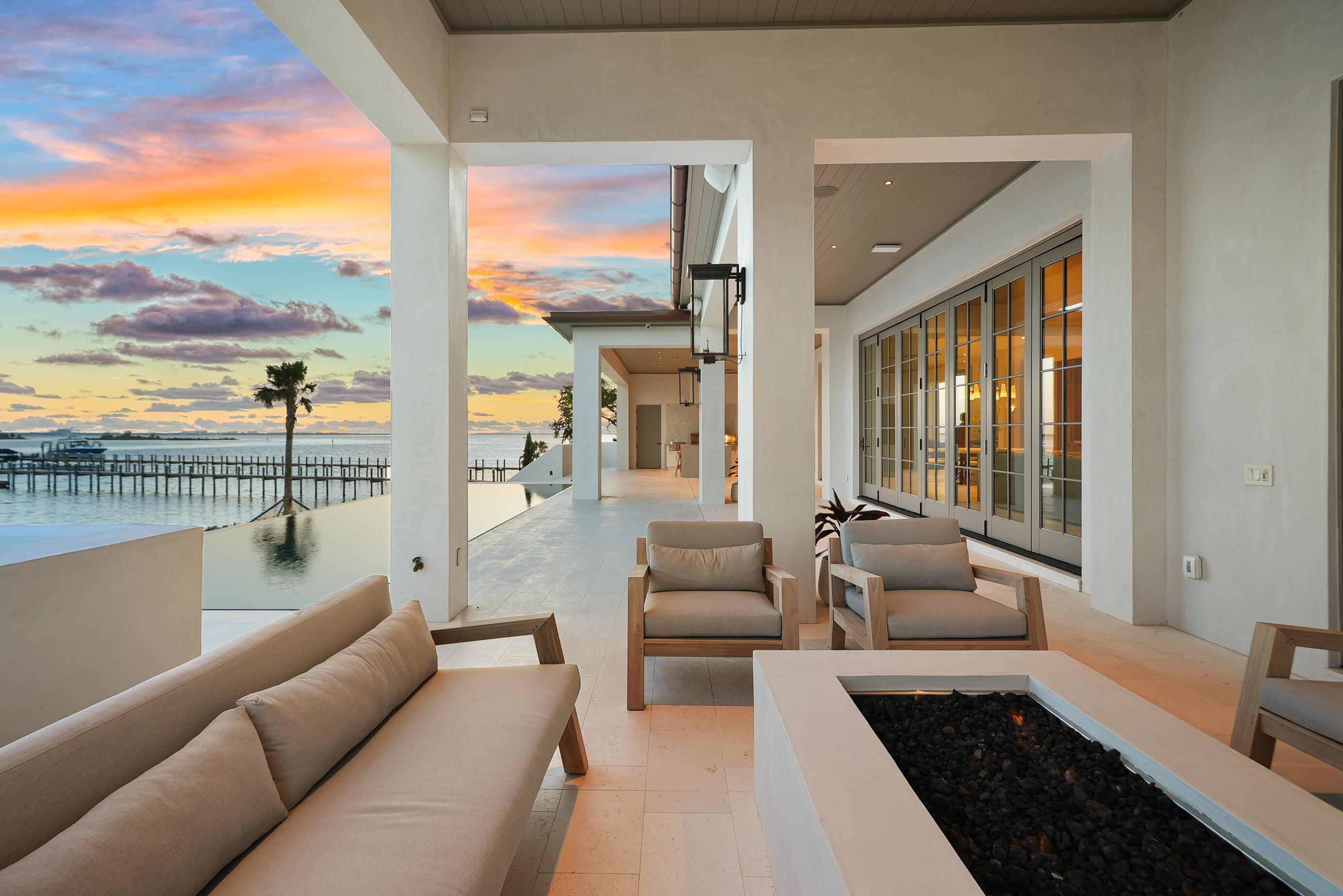 Image 4: Covered Waterfront Lanai With Pool