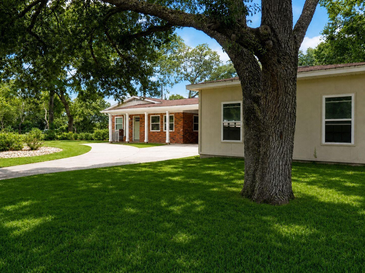 Image 3: Front Elevation with Grass 2