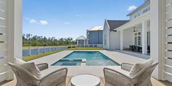 Image 3: Pool Overlooks Pond