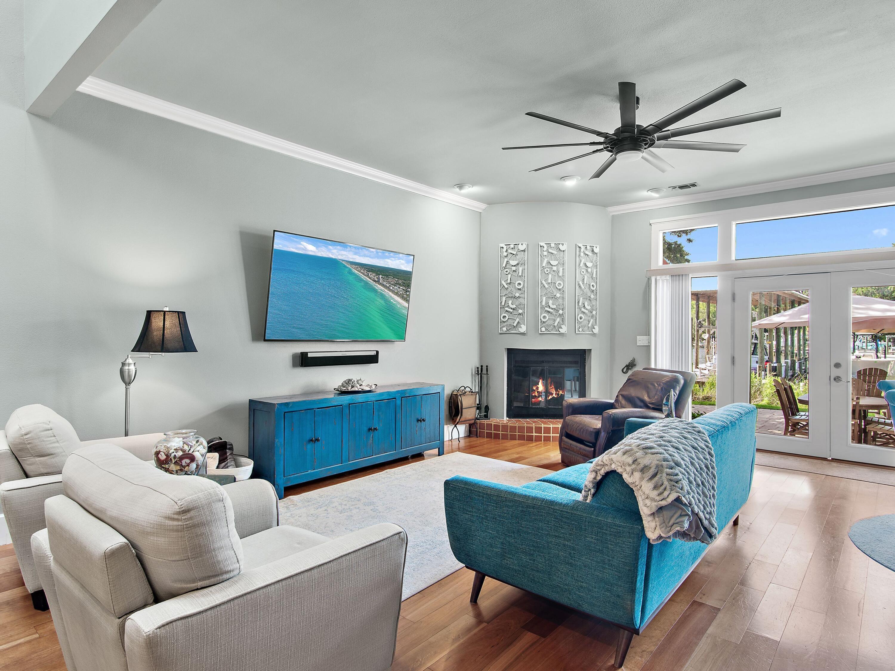 Image 3: Hardwood floors and fireplace