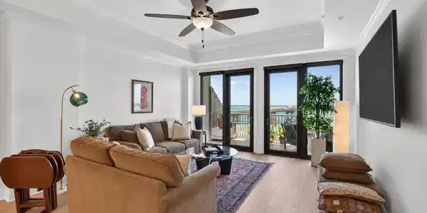 Image 3: Living Room with Balcony Access