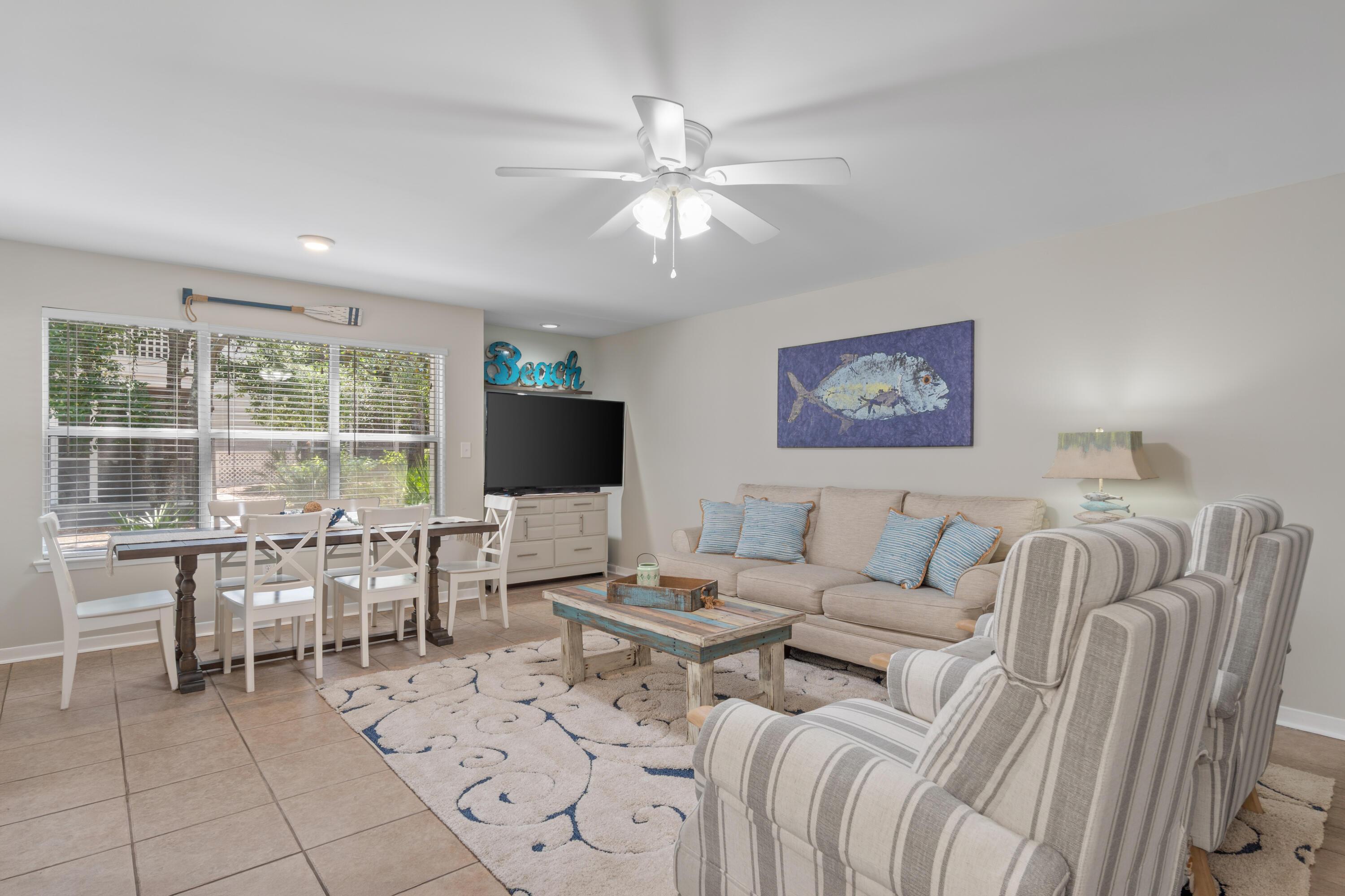 Image 4: hidden-dunes-cottage-living-room-with-tv